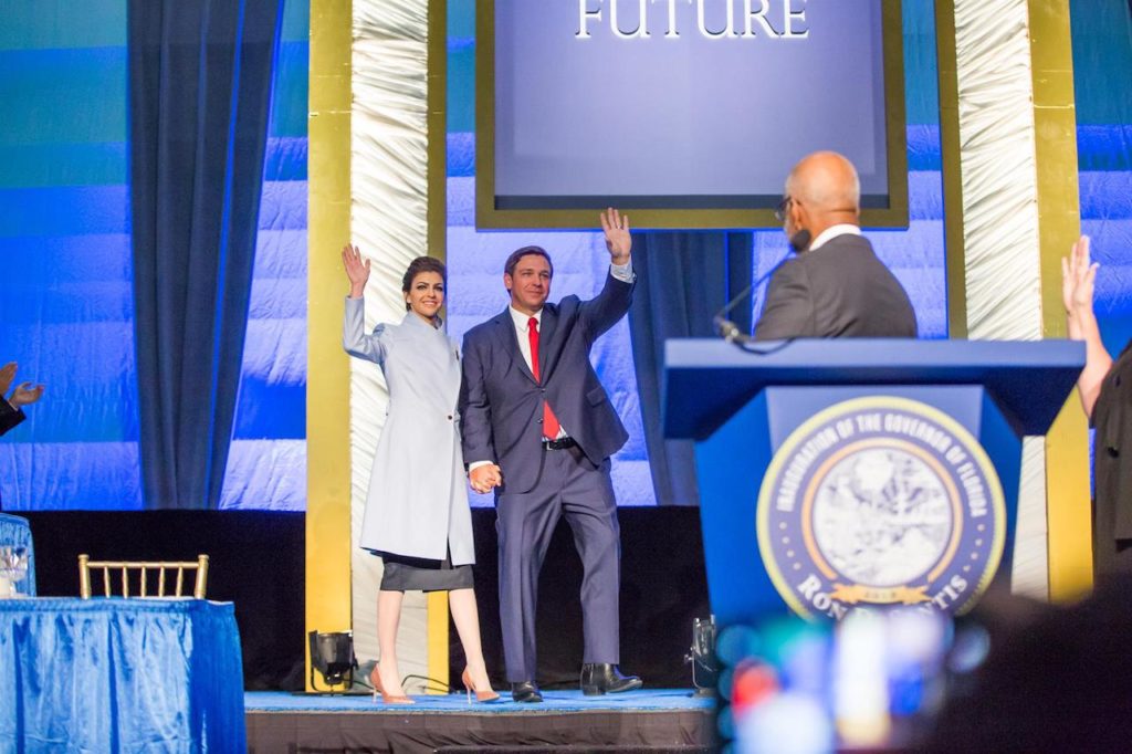 Governor Ron DeSantis and wife Casey wave to attendees at inaugural prayer breakfast