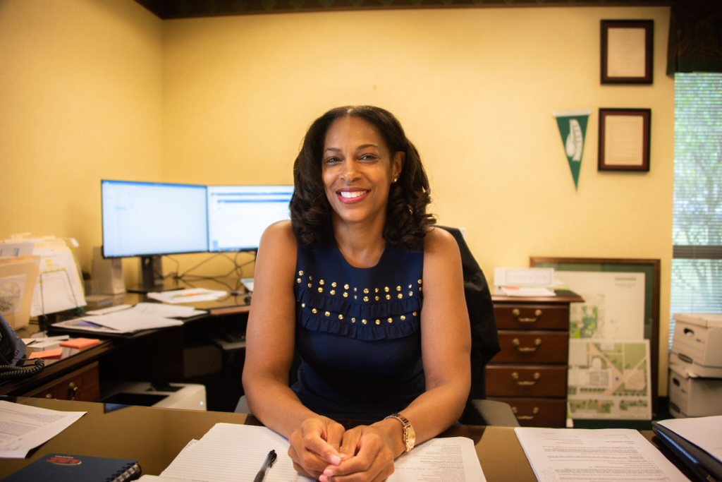 Photo of Bonita Dukes sitting at desk.