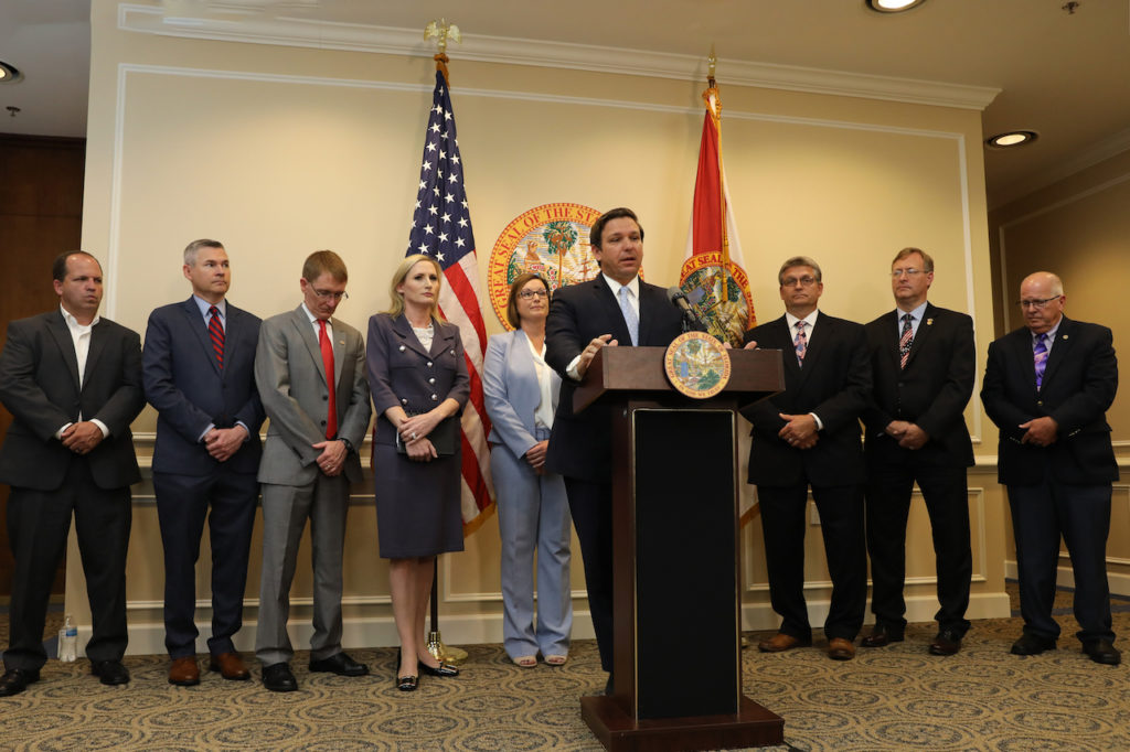 Governor Ron DeSantis pictured making announced that the Florida Department of State (DOS) and Florida’s 67 County Supervisors of Elections will engage in a cooperative cybersecurity initiative ahead of the 2020 election.