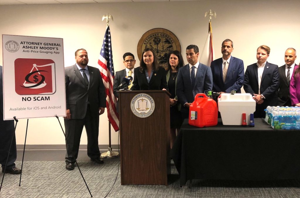 Attorney General Ashley Moody, pictured today at a press conference in Miami, urged Floridians to download the new price gouging app NO SCAM.