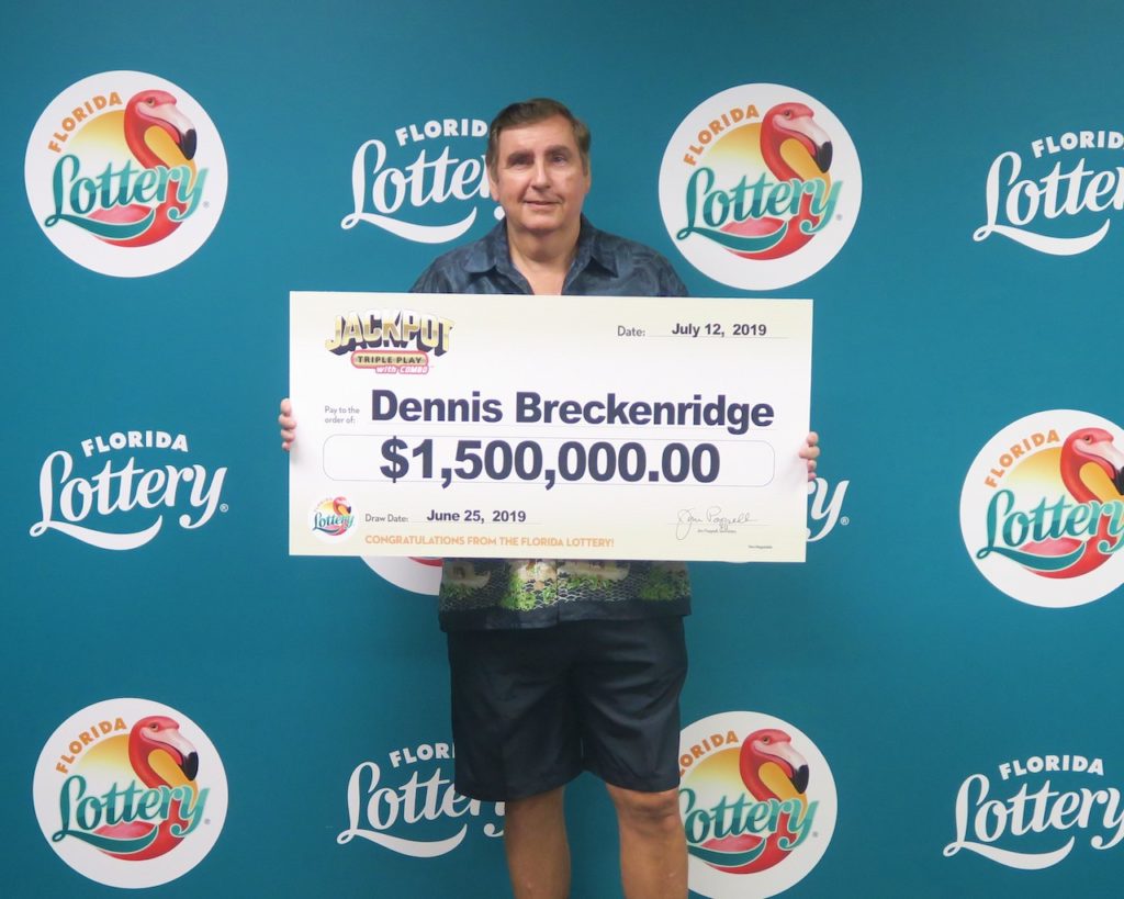 Dennis Breckenridge poses with his oversized check after claiming the $1.5 million JACKPOT TRIPLE PLAY jackpot from the June 25, 2019 drawing at Florida Lottery Headquarters.