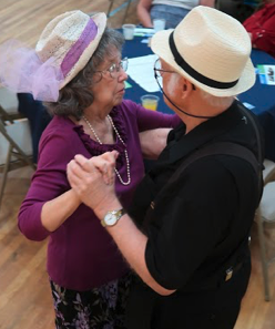 Photo of senior citizen couple dancing at the Inaugural Hats & Flats dance in Tallahassee.