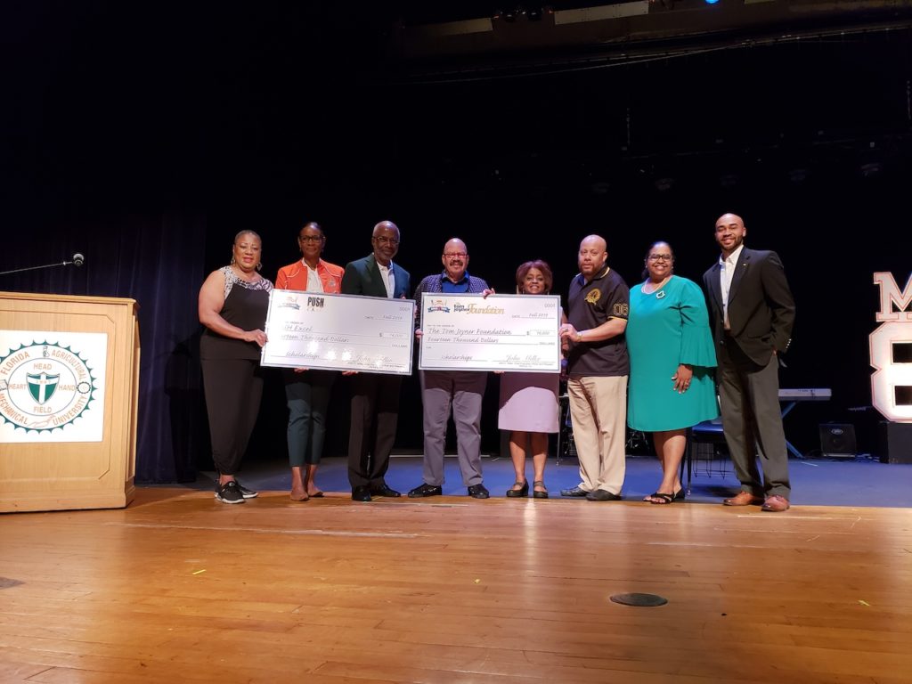 President Larry Robinson, Ph.D., (third from left) and Tom Joyner, of the Tom Joyner Morning Show (fourth from left) join representatives of Denny's, the National Council of Negro Women, PUSH Excel and others as the Denny's Hungry for Education HBCU Tour stopped at FAMU on Saturday, Sept. 14