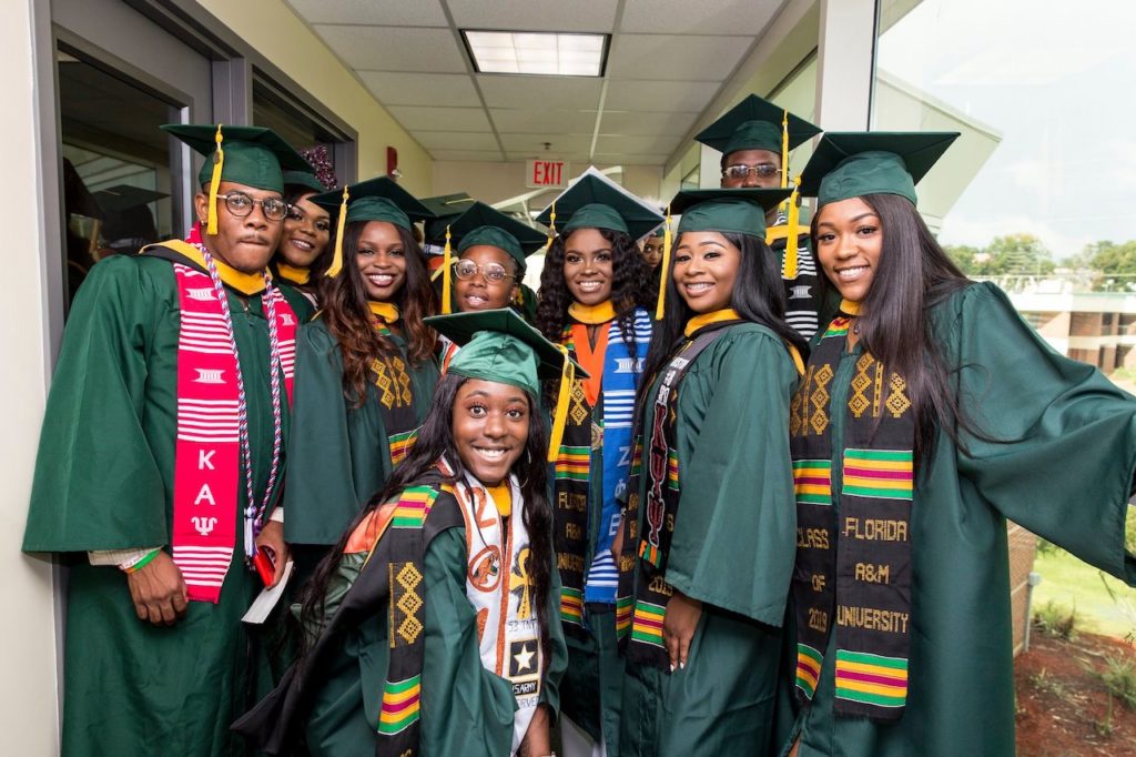 FAMU students on Commencement Day, dressed in their caps and gowns.