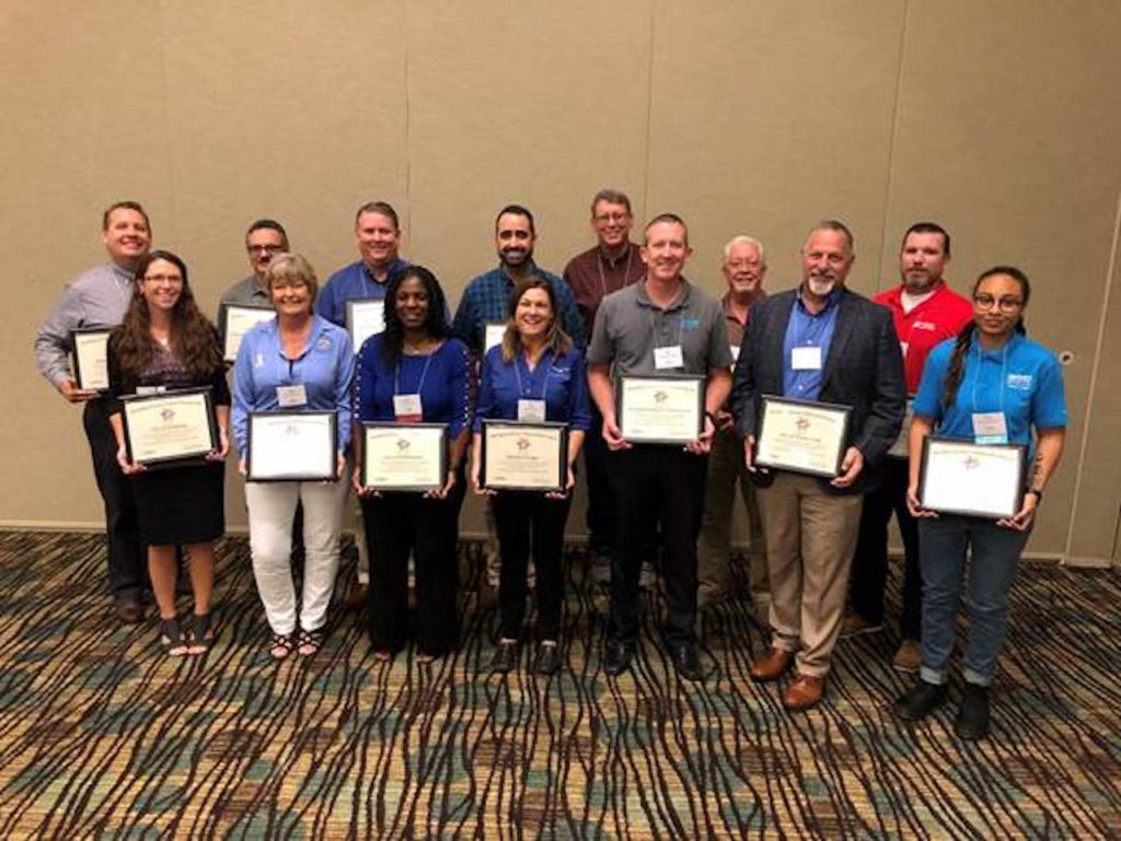 Pictured: Back row (L-R): Eric Weaver (Ocala Electric Utility); Dan Sollitto (Utilities Commission New Smyrna Beach); Chris Gent (Kissimmee Utility Authority); Julio Torrado (Keys Energy Services); Brad Hiers (City of Bartow); Rick Amato (Beaches Energy Services); Korey Bush (Lakeland Electric) Front row (L-R): Jamie English (City of Leesburg); Tammy Snyder (City of Newberry); Rhonda Reaves-Smith (City of Tallahassee); Lynn Scott (Beaches Energy Services); Eddie Fee (Orlando Utilities Commission); Dan D'Alessandro (City of Winter Park); Yvonne Ferguson (Gainesville Regional Utilities) Not pictured: a representative from the City of Bushnell