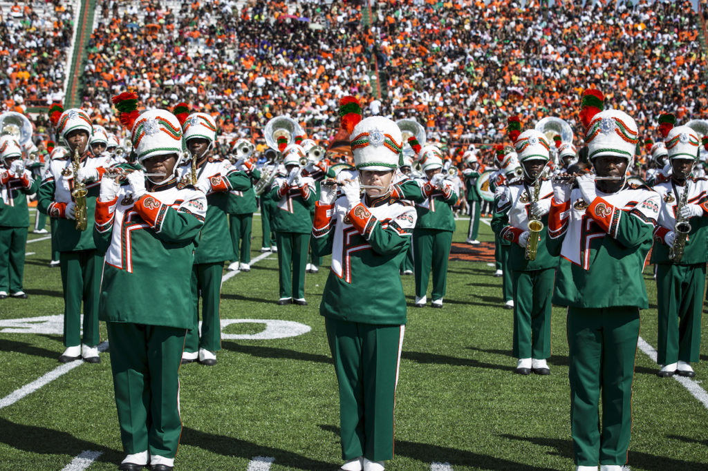 The FAMU Marching "100" performs on football field.