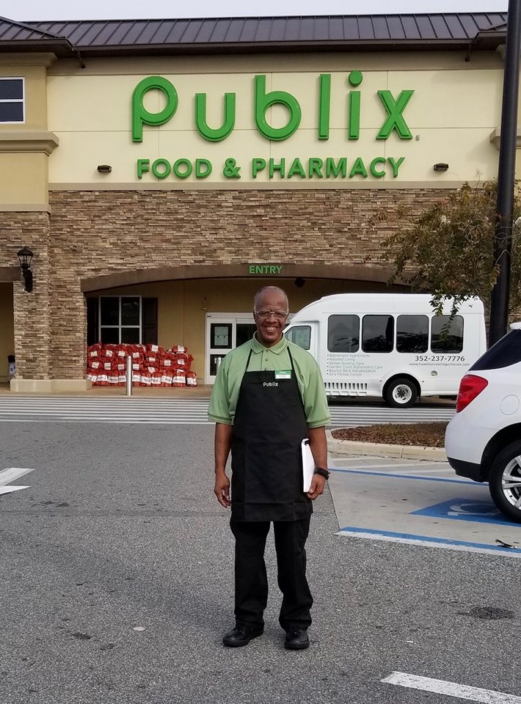 Kenny Burnett took on a second job at the Ocala Grand Oaks Town Center Publix to be able to support his family.