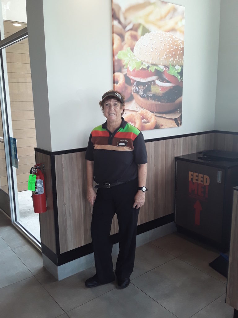 Linda Masessa helps customers have a great experience at the new Burger King in Stuart.