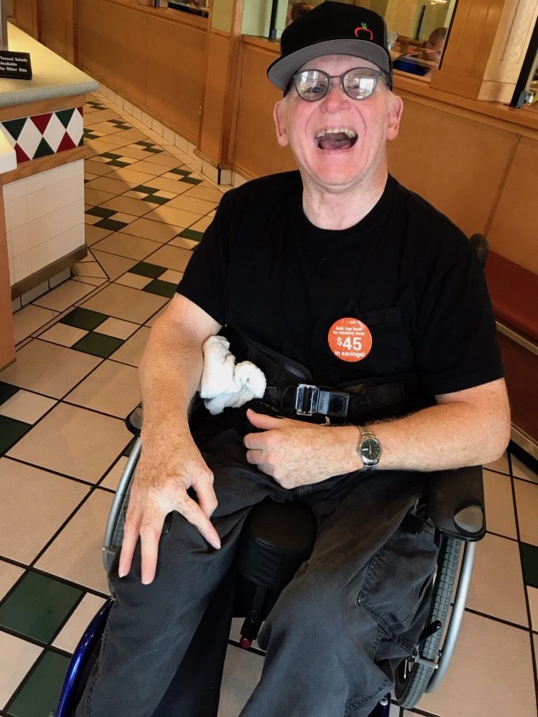 Matt Hightower is proud of his job greeting customers at Sweet Tomatoes in Sarasota.