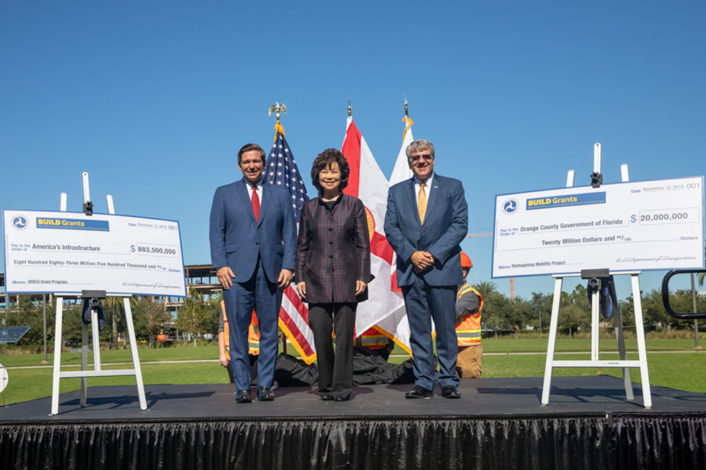 Governor Ron DeSantis pictured with US DOT Secretary Elaine Chao and FDOT Secretary Kevin Thibault.