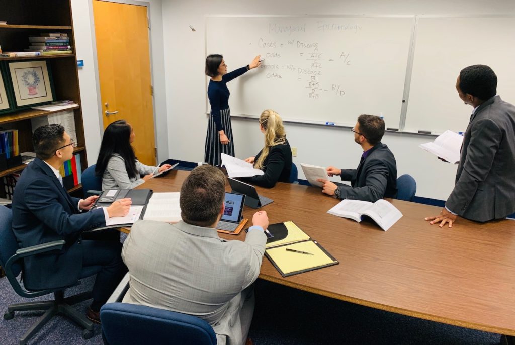 Dr. Sinyoung Park, UNF assistant professor health administration, explaining how epidemiology is used to design and manage healthcare for populations.