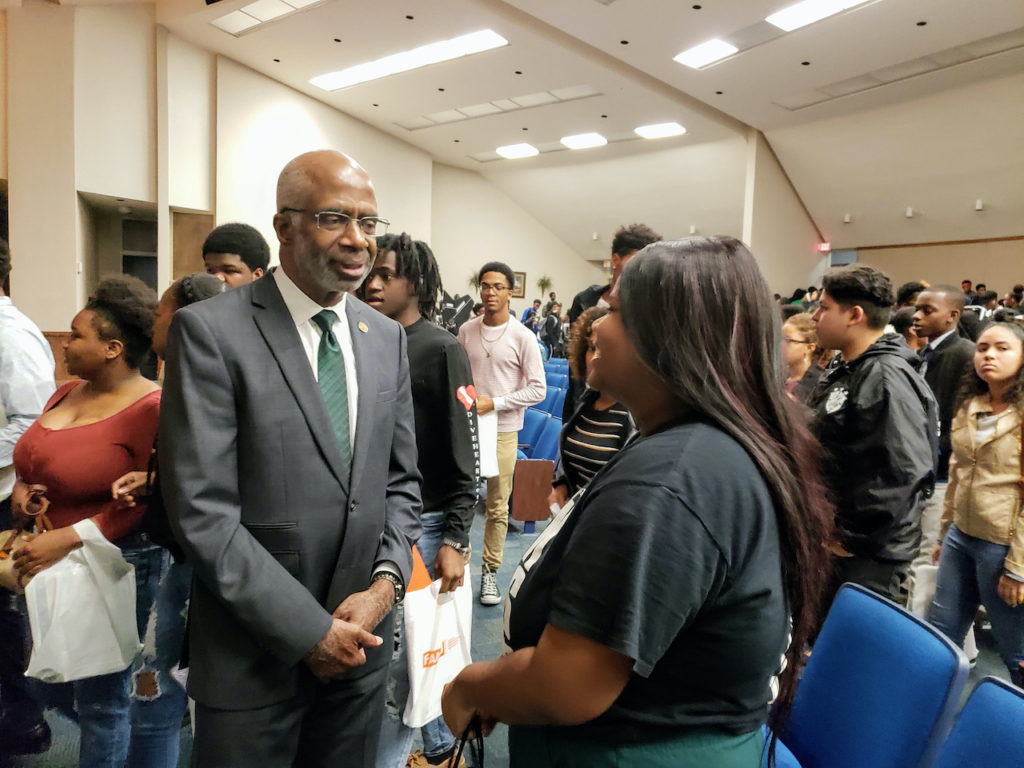 President Larry Robinson pictured speaking with prospective students at Thursday's FAMU recruitment event at Jefferson High School in Tampa, Florida.