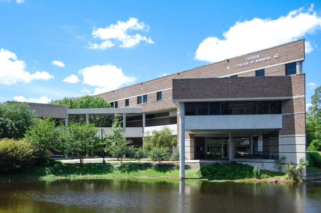 Photograph of the UNF Coggin College of Business building on a sunny day.