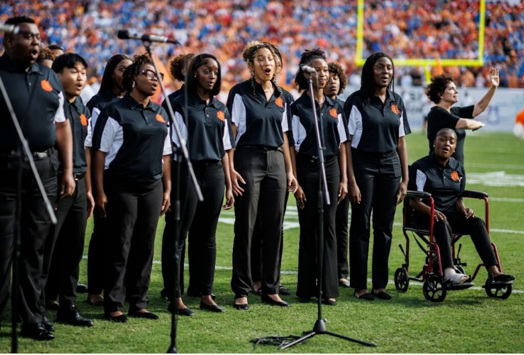 The FAMU Concert Choir performs at Raymond James Stadium for a Tampa Bay Buccaneers NFL game in October 2023. (Credit: FAMU Concert Choir)